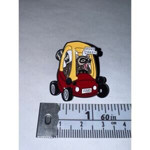 Raccoon in Child’s Toy Car Pin Brooch